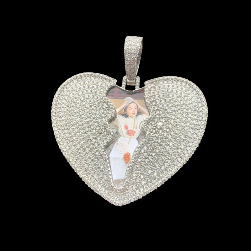 Close-up of 3D customized cracked love heart pendant with personalized photo, iced out design