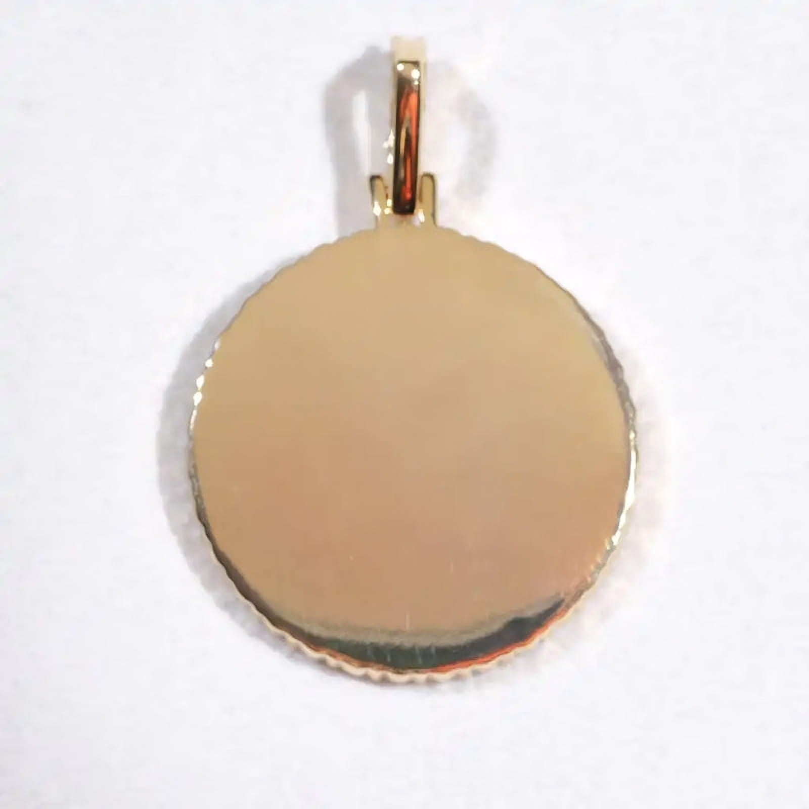 Back view of small custom circle pendant with polished gold finish