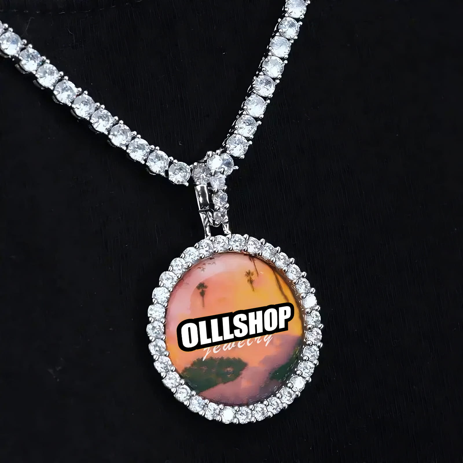 Small custom picture pendant displayed on layered silver chains