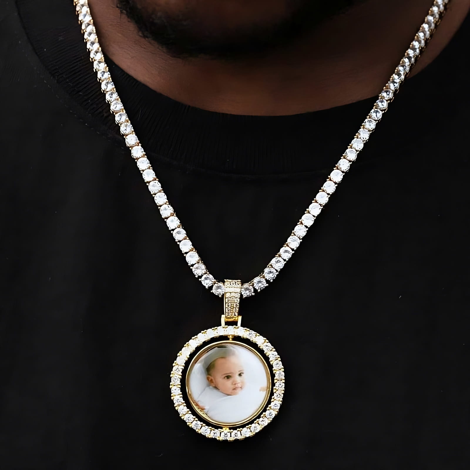 Close-up of gold 3D spinning pendant with photo customization, hip hop jewelry detail