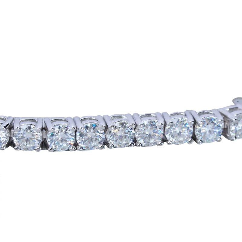 5mm 925 silver white gold moissanite tennis bracelet laid flat with shimmering detail