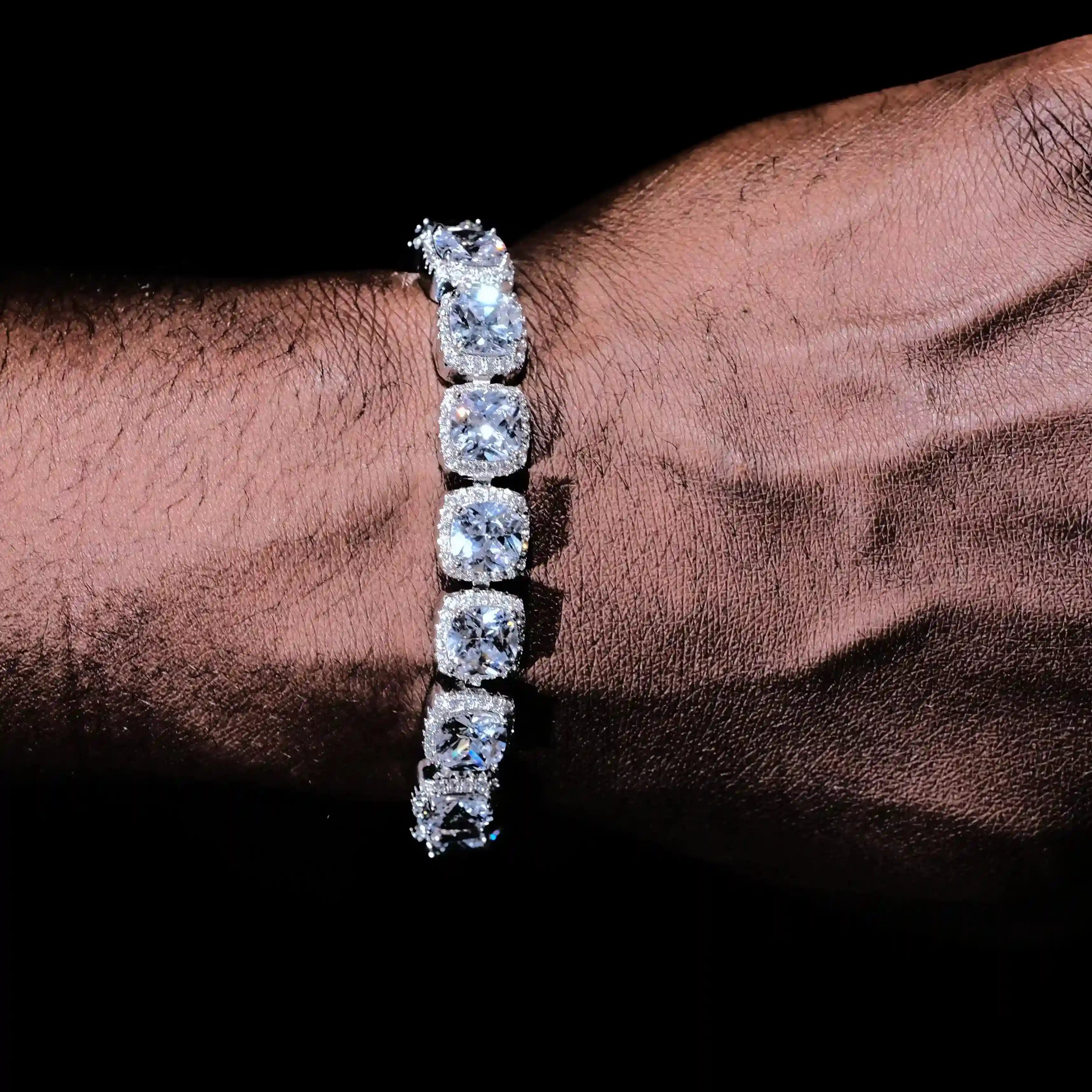 Wrist close-up with Glacier clustered white gold tennis bracelet, iced out design