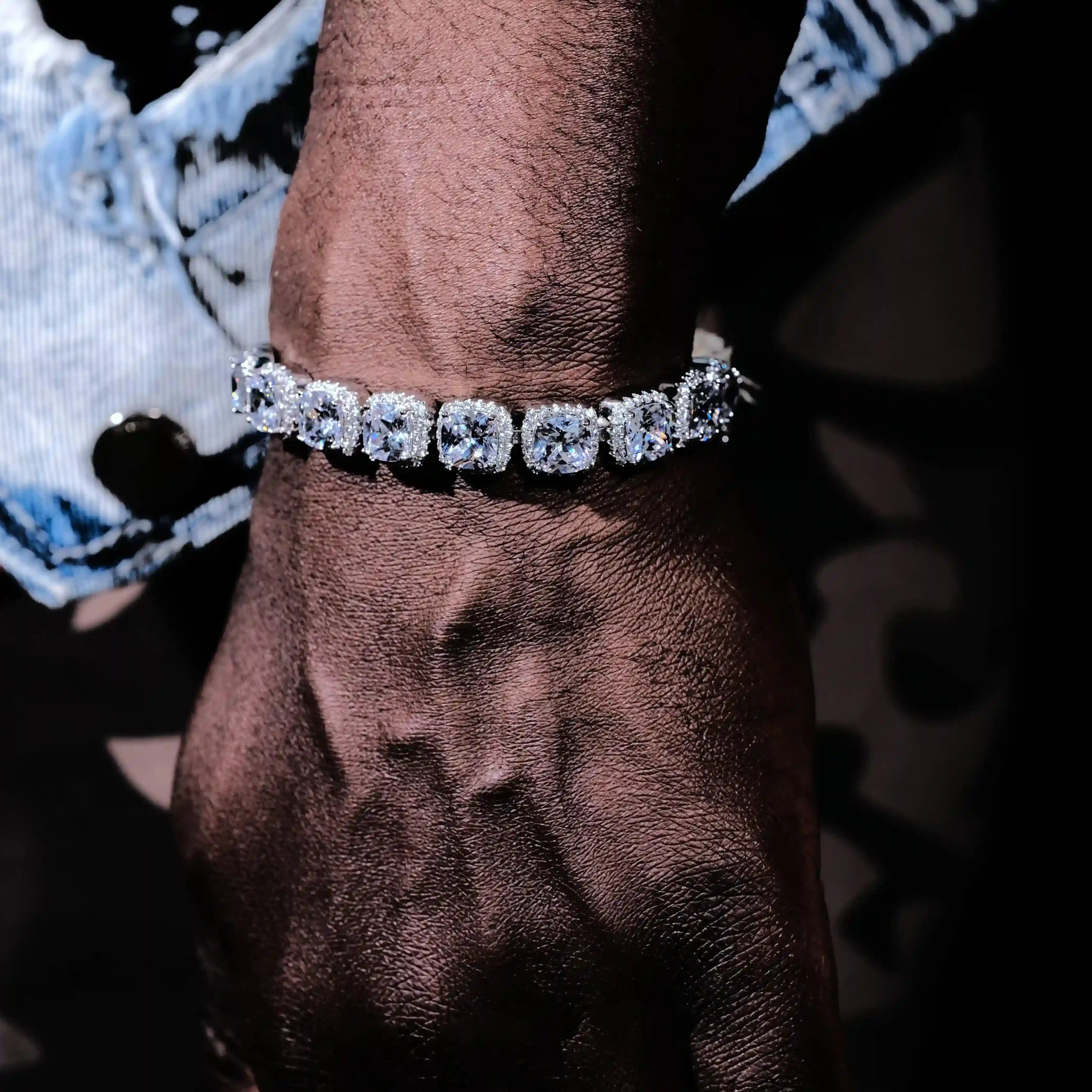 Layered Glacier clustered tennis bracelet in white gold worn on wrist, hip hop jewelry style