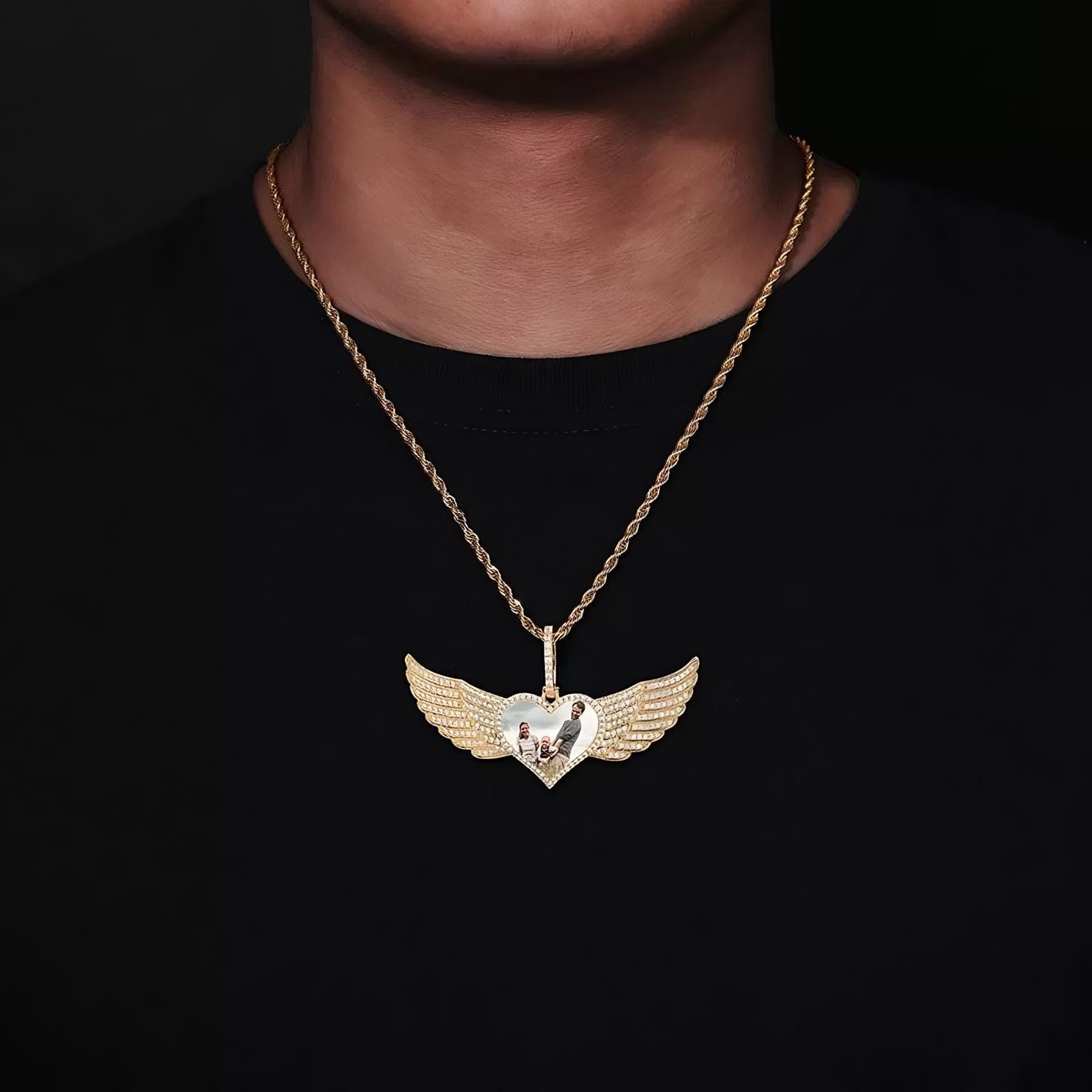 Model wearing 80mm angel wings custom heart pendant necklace in gold