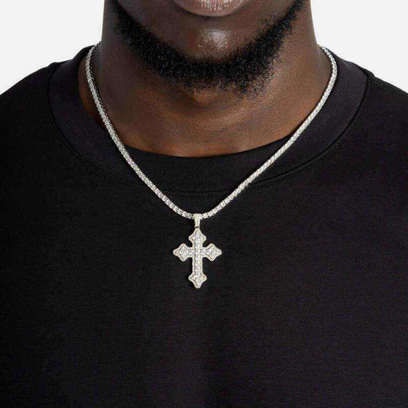 Medium eternity cross pendant necklace in white gold worn on chest