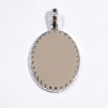 Back view of custom oval pendant with engraved message