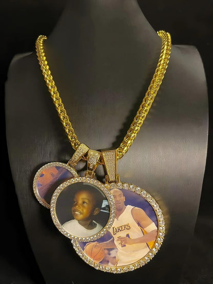 Set of multiple custom circle photo pendants displayed on mannequin