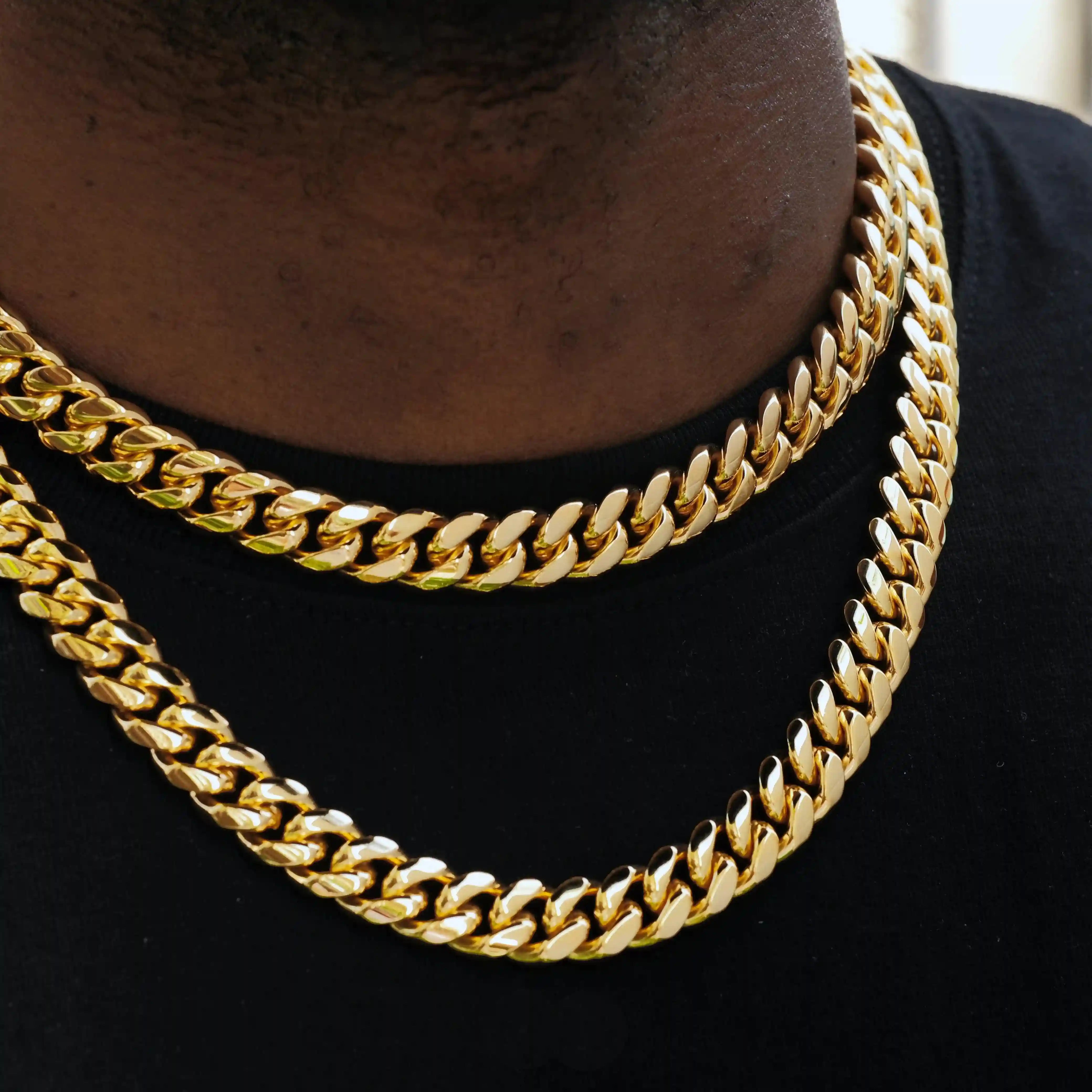 The 12mm Miami Cuban Link Choker by TONGSHOP has strong, sleek links and can be worn alone or layered. Available in 18" and 20" lengths and weighing up to 205 grams in 14k solid gold or 130 grams in 18k gold plated.