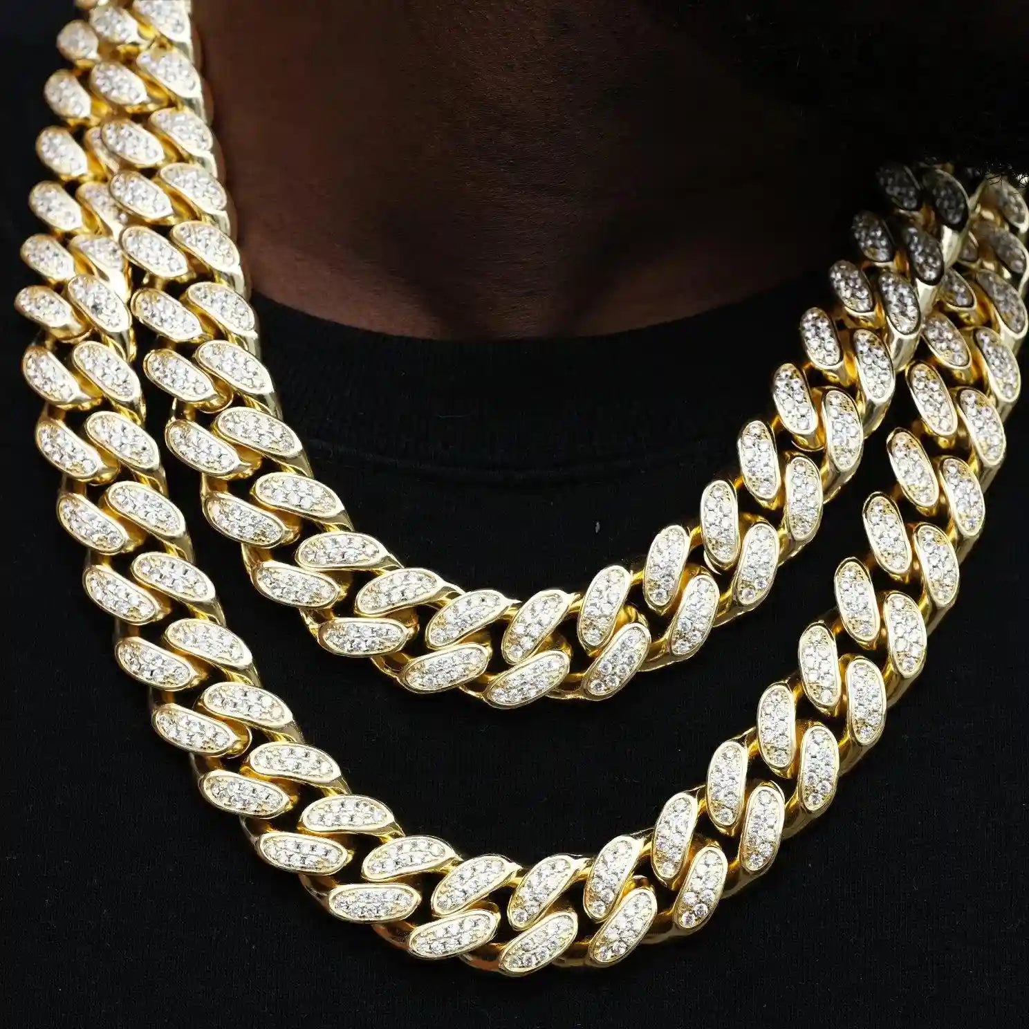 The 19mm Iced Cuban Link Choker is a bold twist on our classic chain. Made with flawless VVS simulated diamonds and 18K gold plating, it comes with a chain, dust bag, gift box, jewelry cloth, and warranty card. Available in lengths of 18, 20, and 24 inches.