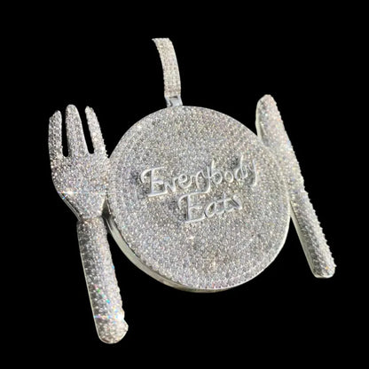 Iced out dinner plate pendant with fork and knife, silver hip hop necklace with “Everybody Eats” design