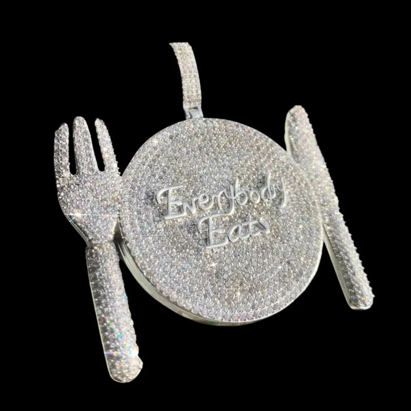 Iced out dinner plate pendant with fork and knife, silver hip hop necklace with “Everybody Eats” design