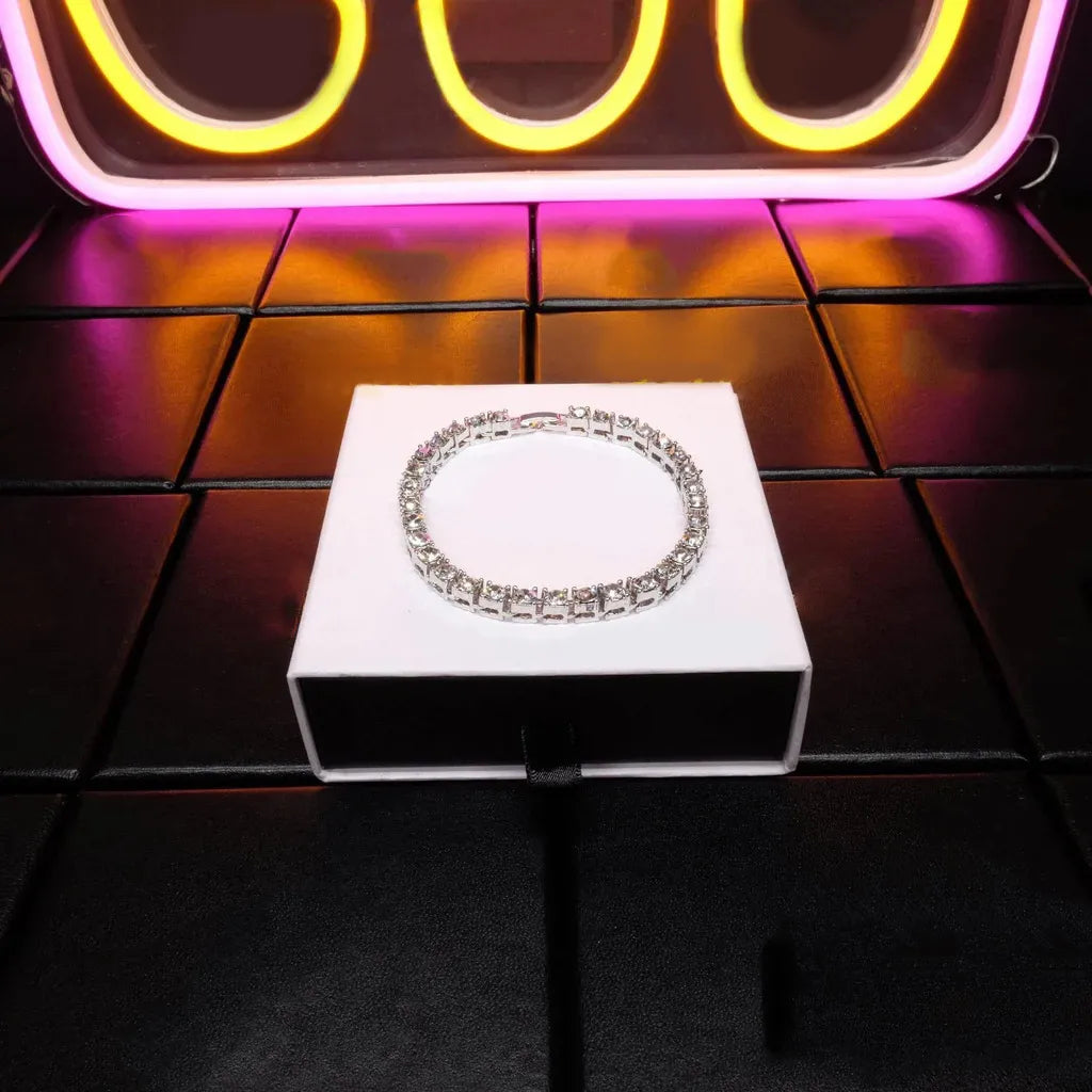 5mm white gold iced tennis bracelet displayed on jewelry stand