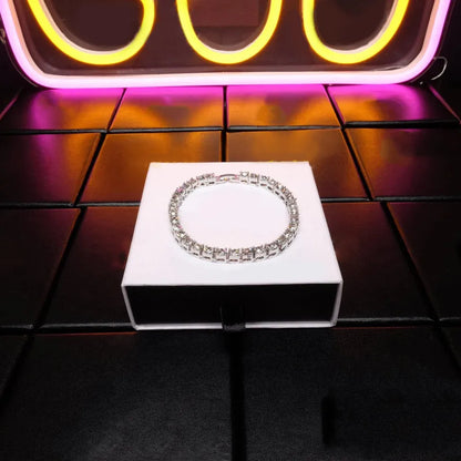 5mm white gold iced tennis bracelet displayed on jewelry stand