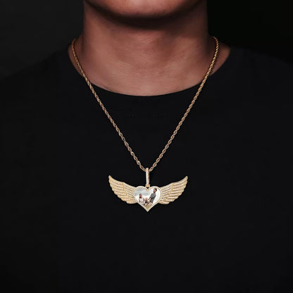 Model wearing 80mm angel wings custom heart pendant necklace in gold 