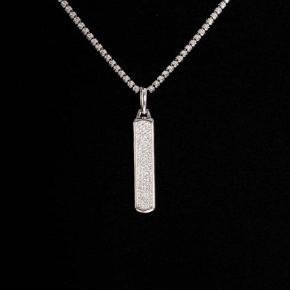 Close-up of skyline bar pendant in white gold with diamonds